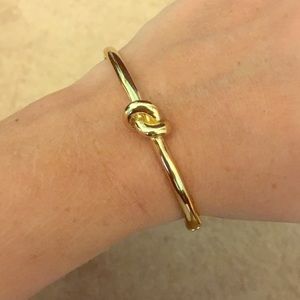 Kate Spade “Knot Bracelet” in gold